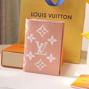 Louis Vuitton pink passport holder